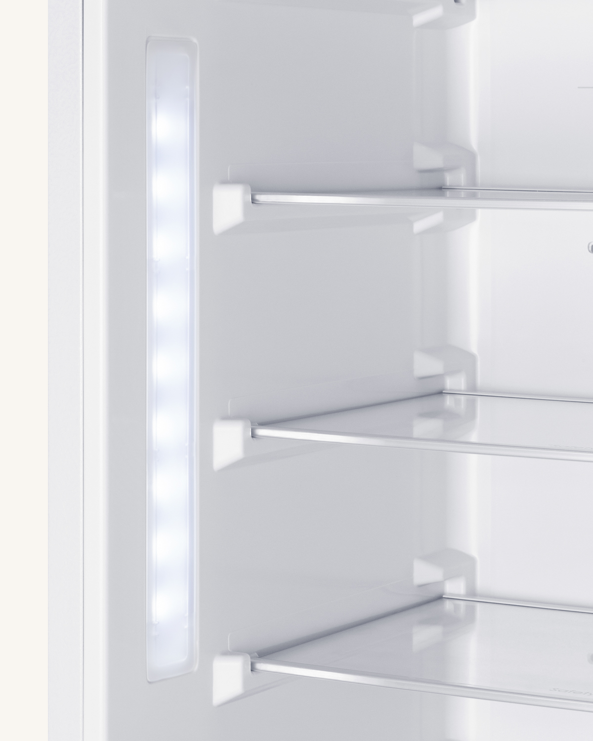 ENERGY STAR certified fully integrated bottom mount counter depth refrigerator-freezer with unfinished front to accept custom panels and fit 76 7/8